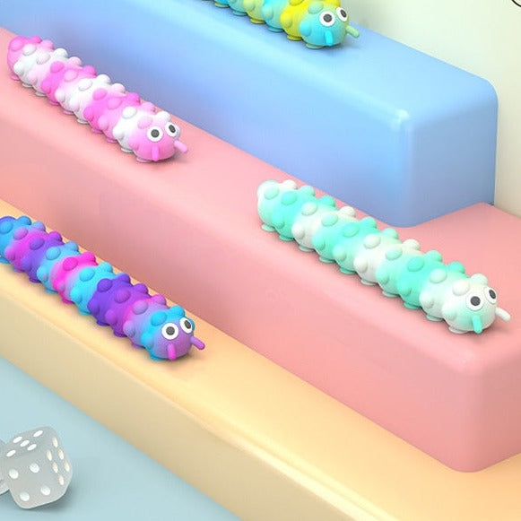 Raupe™ Push Popper Saugraupen