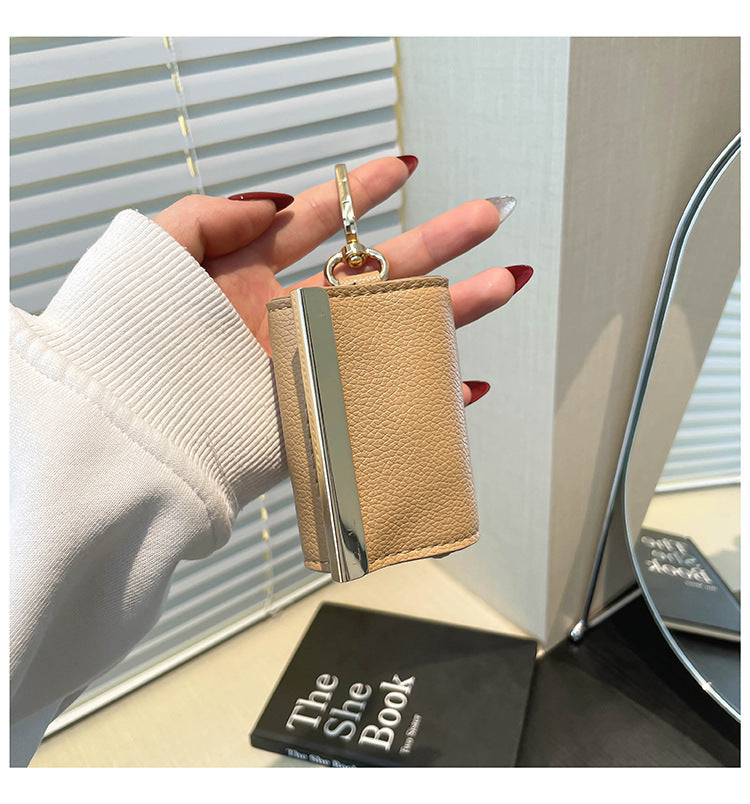 TaschenFix™ Faltbare Schlüsselanhänger-Tasche